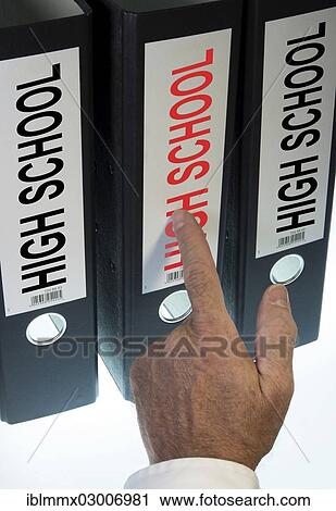 Hand pointing to a file folder labeled " High School" View Large Photo Image Stock Image - Hand pointing to a file folder labeled " High School". Fotosearch