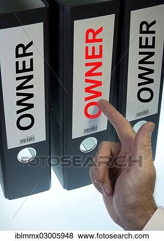 Hand pointing to a file folder labeled " Owner" View Large Photo Image Stock Photo - Hand pointing to a file folder labeled " Owner". Fotosearch