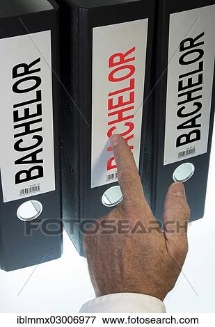 Hand pointing to a file folder labeled " Bachelor" View Large Photo Image Stock Photo - Hand pointing to a file folder labeled " Bachelor". Fotosearch