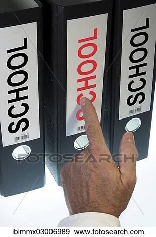 Hand pointing to a file folder labeled " School" View Large Photo Image Stock Photo - Hand pointing to a file folder labeled " School". Fotosearch