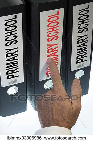 Hand pointing to a file folder labeled " Primary School" View Large Photo Image Stock Photograph - Hand pointing to a file folder labeled " Primary School". Fotosearch