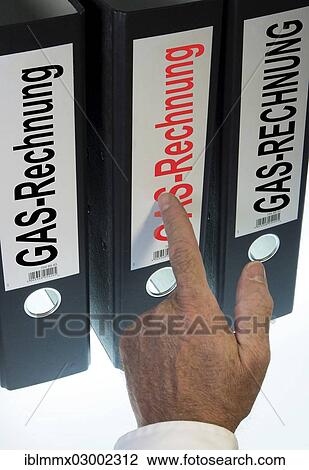 "Hand pointing to a ring binder labeled Gasrechnung, German for gas bill, symbolic image" View Large Photo Image Stock Image - "Hand pointing to a ring binder labeled Gasrechnung, German for gas bill, symbolic image". Fotosearch