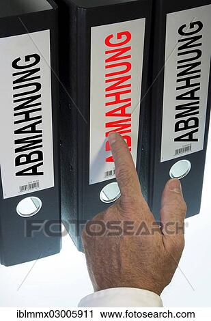 "Hand pointing to a ring binder labelled """"ABMAHNUNG"""", German for """"warning letter""""" View Large Photo Image Stock Image - "Hand pointing to a ring binder labelled """"ABMAHNUNG"""", German for """"warning letter""""". Fotosearch