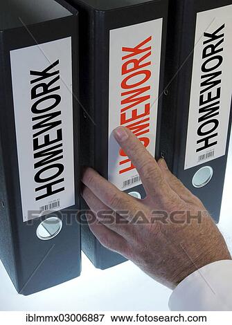 Hand reaching for a file folder labeled " Homework" View Large Photo Image Stock Photo - Hand reaching for a file folder labeled " Homework". Fotosearch