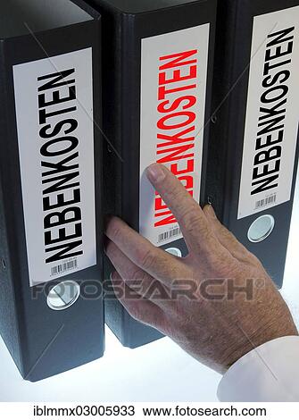 Stock Image - "Hand reaching for a file folder labeled """"Nebenkosten"""", German for """"utilities""""". Fotosearch