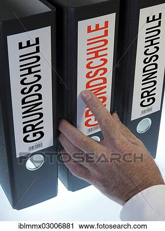 "Hand reaching for a file folder labeled """"Grundschule"""", German for """"elementary school""""" View Large Photo Image Stock Image - "Hand reaching for a file folder labeled """"Grundschule"""", German for """"elementary school""""". Fotosearch
