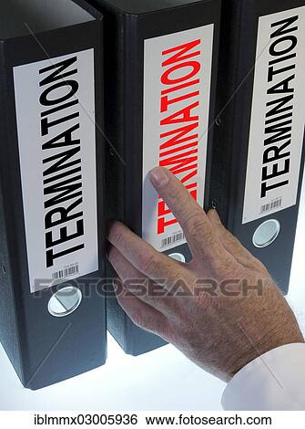 "Hand reaching for a file folder labeled """"Kuendigung"""", German for """"lay-off"""" or """"cancellation""""" View Large Photo Image Stock Photograph - "Hand reaching for a file folder labeled """"Kuendigung"""", German for """"lay-off"""" or """"cancellation""""". Fotosearch