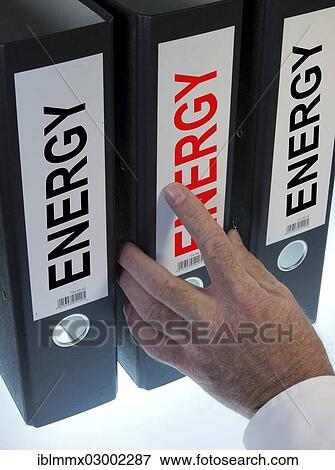 "Hand reaching for a ring binder labeled Energy, symbolic image" View Large Photo Image Stock Photo - "Hand reaching for a ring binder labeled Energy, symbolic image". Fotosearch