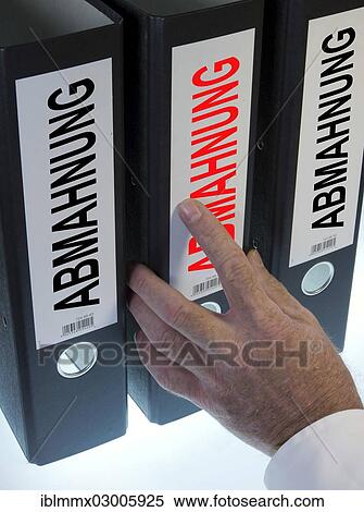 "Hand reaching for a ring binder labelled """"ABMAHNUNG"""", German for """"warning letter""""" View Large Photo Image Stock Photography - "Hand reaching for a ring binder labelled """"ABMAHNUNG"""", German for """"warning letter""""". Fotosearch