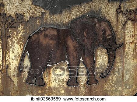 Stock Photo - "Handcrafted elephant illustration on a cauldron, Fort Namutoni, Etosha National Park, Oshikoto Region, Namibia, Africa". Fotosearch