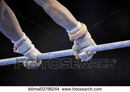 "Hands of a gymnast competing on the high bar, 31st DTB Cup, Gymnastics World Cup, Baden-Wurttemberg, Germany, Europe" View Large Photo Image Picture - "Hands of a gymnast competing on the high bar, 31st DTB Cup, Gymnastics World Cup, Baden-Wurttemberg, Germany, Europe". Fotosearch