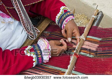 Stock Photo - "Hands of a woman, Quechua Indian, at work on a loom, Cinchero, Urubamba Valley, Peru, South America". Fotosearch