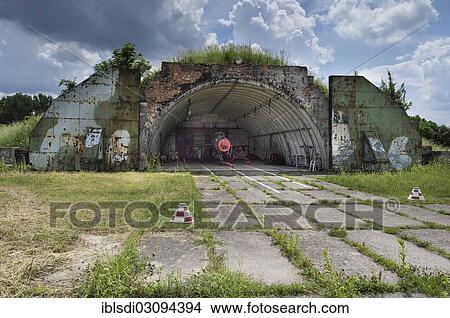 "Hangar with a MIG-21 SMT aircraft, a relatively rare version in Germany, left behind in 1993 by the Soviet air forces during their withdrawal, at the Altenburg Nobitz Airfield, Nobitz, Altenburg, Thuringia, Germany, Europe" View Large Photo Image Picture - "Hangar with a MIG-21 SMT aircraft, a relatively rare version in Germany, left behind in 1993 by the Soviet air forces during their withdrawal, at the Altenburg Nobitz Airfield, Nobitz, Altenburg, Thuringia, Germany, Europe". Fotosearch