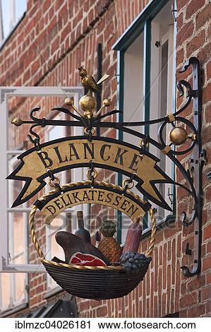 "Hanging sign of a delicatessen, Luneburg, Lower Saxony, Germany, Europe" View Large Photo Image Stock Image - "Hanging sign of a delicatessen, Luneburg, Lower Saxony, Germany, Europe". Fotosearch