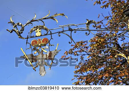 "Hanging sign of Gasthof Adler, Grossholzleute, Allgau, Bavaria, Germany, Europe" View Large Photo Image Stock Image - "Hanging sign of Gasthof Adler, Grossholzleute, Allgau, Bavaria, Germany, Europe". Fotosearch