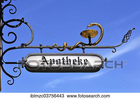 "Hanging sign of St. George Apotheke pharmacy against a blue sky, Dinkelsbuhl, Middle Franconia, Bavaria, Germany, Europe" View Large Photo Image Stock Image - "Hanging sign of St. George Apotheke pharmacy against a blue sky, Dinkelsbuhl, Middle Franconia, Bavaria, Germany, Europe". Fotosearch