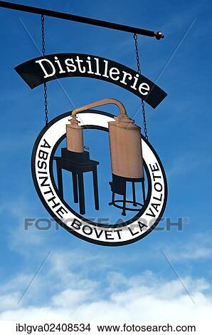"Hanging sign of the absinthe distillery Bovet La Valote, Motiers, Val-de-Travers, Canton of Neuchatel, Switzerland, Europe" View Large Photo Image Picture - "Hanging sign of the absinthe distillery Bovet La Valote, Motiers, Val-de-Travers, Canton of Neuchatel, Switzerland, Europe". Fotosearch