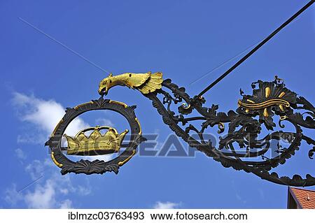 "Hanging sign of the """"Goldene Krone"""" guesthouse, Dinkelsbuhl, Middle Franconia, Bavaria, Germany, Europe" View Large Photo Image Stock Image - "Hanging sign of the """"Goldene Krone"""" guesthouse, Dinkelsbuhl, Middle Franconia, Bavaria, Germany, Europe". Fotosearch