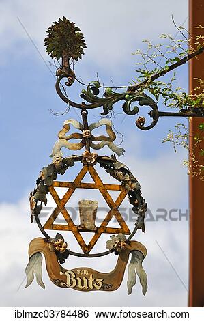 Stock Photograph - "Hanging sign of the inn """"Zum Butz"""", Rothenburg ob der Tauber, Middle Franconia, Bavaria, Germany, Europe". Fotosearch