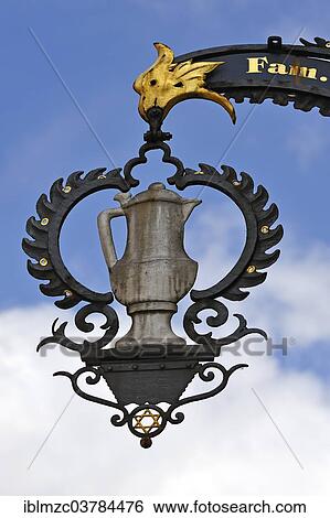 "Hanging sign of the restaurant """"Gasthaus Zur Silbernen Kanne"""", Rothenburg ob der Tauber, Middle Franconia, Bavaria, Germany, Europe" View Large Photo Image Stock Photograph - "Hanging sign of the restaurant """"Gasthaus Zur Silbernen Kanne"""", Rothenburg ob der Tauber, Middle Franconia, Bavaria, Germany, Europe". Fotosearch