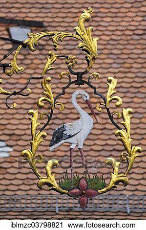 "Hanging sign of the """"Zum Storchen"""" restaurant, inn since about 1580, Bad Windsheim, Middle Franconia, Bavaria, Germany, Europe" View Large Photo Image Stock Image - "Hanging sign of the """"Zum Storchen"""" restaurant, inn since about 1580, Bad Windsheim, Middle Franconia, Bavaria, Germany, Europe". Fotosearch