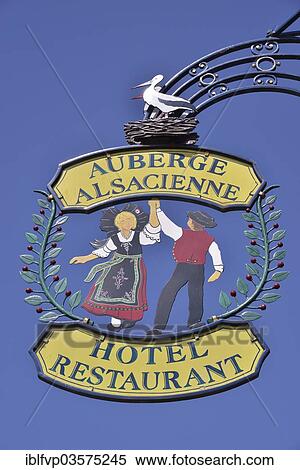 "Hanging sign on an Alsatian restaurant, Eguisheim, Departement Haut-Rhin, Alsace, France, Europe" View Large Photo Image Stock Photography - "Hanging sign on an Alsatian restaurant, Eguisheim, Departement Haut-Rhin, Alsace, France, Europe". Fotosearch