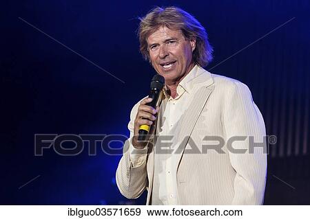 "Hansi Hintersser, Austrian folk music and pop singer, performing live at the Schlagernacht music event at the trade fair venue in Lucerne, Luzern, Canton of Lucerne, Switzerland, Europe" View Large Photo Image Stock Photo - "Hansi Hintersser, Austrian folk music and pop singer, performing live at the Schlagernacht music event at the trade fair venue in Lucerne, Luzern, Canton of Lucerne, Switzerland, Europe". Fotosearch