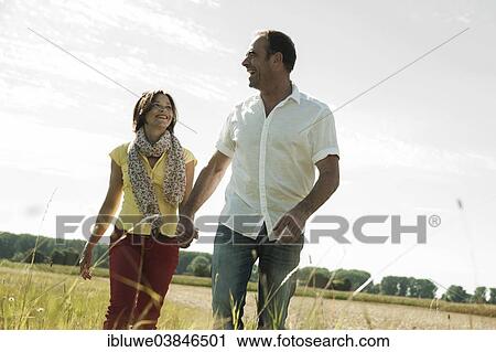 "Happy couple oudoors, Baden-Wurttemberg, Germany, Europe" View Large Photo Image Stock Image - "Happy couple oudoors, Baden-Wurttemberg, Germany, Europe". Fotosearch