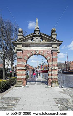 Stock Image - "Harbor gate, historic city gate from 1635, Emden, East Frisia, Lower Saxony, Germany, Europe". Fotosearch