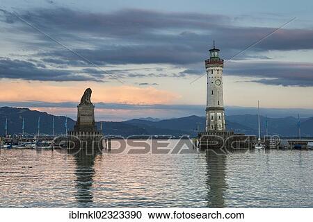 "Harbor of Lindau in the evening light, with the statue of the Bavarian lion and the lighthouse, Lake Constance, Bavaria, Germany, Europe" View Large Photo Image Stock Image - "Harbor of Lindau in the evening light, with the statue of the Bavarian lion and the lighthouse, Lake Constance, Bavaria, Germany, Europe". Fotosearch