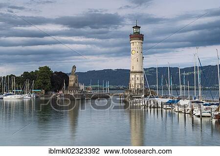 "Harbor of Lindau in the evening light, with the statue of the Bavarian lion and the lighthouse, Lake Constance, Bavaria, Germany, Europe" View Large Photo Image Stock Image - "Harbor of Lindau in the evening light, with the statue of the Bavarian lion and the lighthouse, Lake Constance, Bavaria, Germany, Europe". Fotosearch