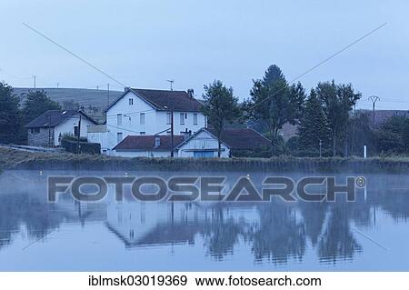 "Harbour at Les Forges d'Uzemain, Canal des Vosges, formerly Canal de l'Est, morning mood with morning fog, Uzemain, Epinal, Lorraine, Departement Vosges, France, Europe" View Large Photo Image Stock Photo - "Harbour at Les Forges d'Uzemain, Canal des Vosges, formerly Canal de l'Est, morning mood with morning fog, Uzemain, Epinal, Lorraine, Departement Vosges, France, Europe". Fotosearch