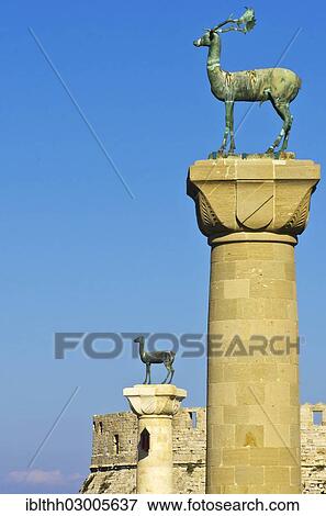 "Harbour entrance of Rhodes with Elafos and Elafina, sculptures of a deer buck and a doe on columns, Mandraki harbour, Rhodes, Rhodos Island, Dodecanese, Greece, Europe" View Large Photo Image Stock Photo - "Harbour entrance of Rhodes with Elafos and Elafina, sculptures of a deer buck and a doe on columns, Mandraki harbour, Rhodes, Rhodos Island, Dodecanese, Greece, Europe". Fotosearch