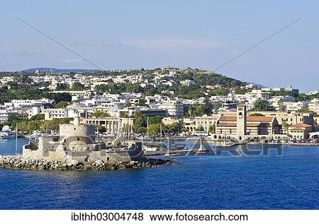 Stock Photo - "Harbour entrance of Rhodes with the fortified tower of Agios Nikolaos, Rhodes, Rhodos Island, Dodecanese, Greece, Europe". Fotosearch