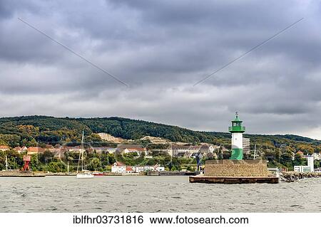 "Harbour entrance with a pier and a lighthouse, Sassnitz, Rugen, Mecklenburg-Western Pomerania, Germany, Europe" View Large Photo Image Stock Photograph - "Harbour entrance with a pier and a lighthouse, Sassnitz, Rugen, Mecklenburg-Western Pomerania, Germany, Europe". Fotosearch