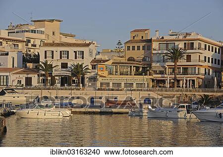 Stock Image - "Harbour in the morning light, Cala Rajada, Majorca, Balearic Islands, Spain, Europe". Fotosearch