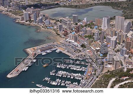 "Harbour of Calp from the rock Penon de Ifach or Penyal d’Ifac, Costa Blanca, Calp, Costa Blanca, Alicante province, Spain, Europe" View Large Photo Image Stock Photograph - "Harbour of Calp from the rock Penon de Ifach or Penyal d’Ifac, Costa Blanca, Calp, Costa Blanca, Alicante province, Spain, Europe". Fotosearch