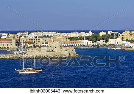 "Harbour of Rhodes with a housing complex and a sailing ship, Rhodes, Rhodos Island, Dodecanese, Greece, Europe" View Large Photo Image Stock Image - "Harbour of Rhodes with a housing complex and a sailing ship, Rhodes, Rhodos Island, Dodecanese, Greece, Europe". Fotosearch