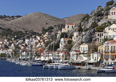 "Harbour of the town of Symi with picturesque houses in the neo-classical style, Symi, Symi Island, Dodecanese, Greece, Europe" View Large Photo Image Stock Image - "Harbour of the town of Symi with picturesque houses in the neo-classical style, Symi, Symi Island, Dodecanese, Greece, Europe". Fotosearch