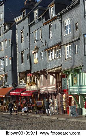 Stock Image - "Harbour street with restaurants and shops, Honfleur, Normandy, France, Europe". Fotosearch