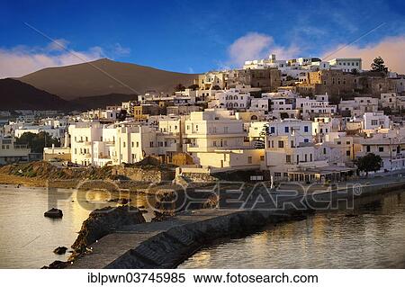 Stock Photography - "Harbour view of Naxos town in the evening light, Naxos, Cyclades, Greece, Europe". Fotosearch