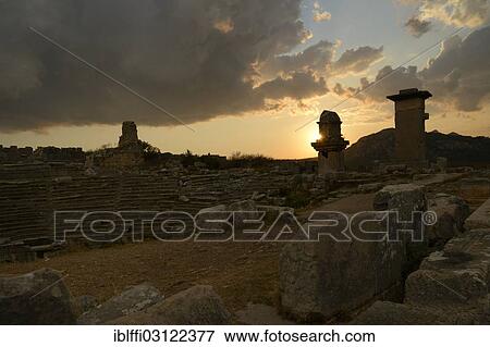 "Harpyien pillar tombs of the ancient city of Xanthos at sunset, Xanthos, Xanthostal, Lykien, Turkey, Asia" View Large Photo Image Stock Photo - "Harpyien pillar tombs of the ancient city of Xanthos at sunset, Xanthos, Xanthostal, Lykien, Turkey, Asia". Fotosearch