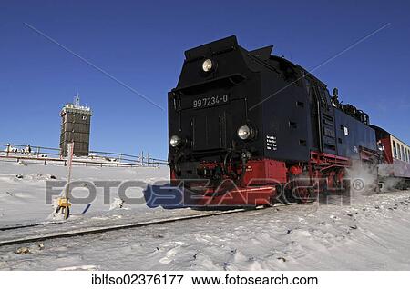 "Harz narrow gauge railway in winter on Mt Brocken, Harz National Park, Saxony-Anhalt, Germany, Europe" View Large Photo Image Stock Photo - "Harz narrow gauge railway in winter on Mt Brocken, Harz National Park, Saxony-Anhalt, Germany, Europe". Fotosearch