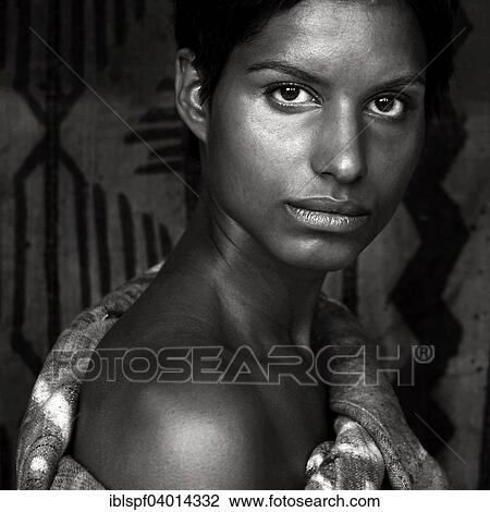 Stock Image - Haunting portrait of a dark-skinned young woman. Fotosearch