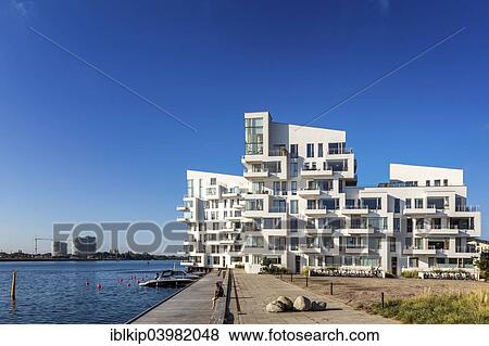 Stock Photo - "Havneholmen, or Harbour Isle, modern city appartment building at Copenhagen waterfront, Kalvebod Brygge, Copenhagen, Denmark, Europe". Fotosearch