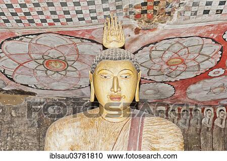 Stock Image - "Head, Buddha statue, colourful murals on the ceiling, fresco, Maharaja-Iena cave, Buddhist cave temple of Dambulla, Golden Temple of Dambulla, Central Province, Sri Lanka, Asia". Fotosearch