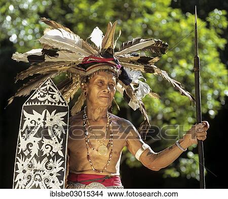 "Head hunter of the ethnic group of the Iban people with a spear, Skrang River, Rajang, Sarawak, Borneo, Malaysia, Asia" View Large Photo Image Picture - "Head hunter of the ethnic group of the Iban people with a spear, Skrang River, Rajang, Sarawak, Borneo, Malaysia, Asia". Fotosearch