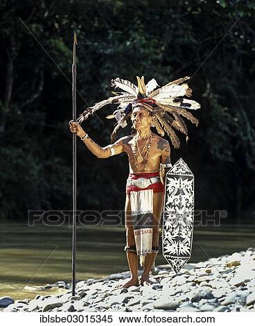 "Head hunter of the ethnic group of the Iban people with a spear, Skrang River, Rajang, Sarawak, Borneo, Malaysia, Asia" View Large Photo Image Stock Photography - "Head hunter of the ethnic group of the Iban people with a spear, Skrang River, Rajang, Sarawak, Borneo, Malaysia, Asia". Fotosearch