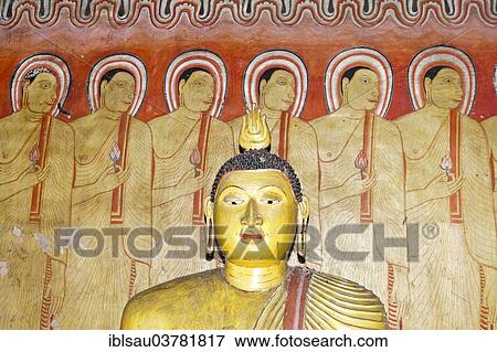 Stock Photo - "Head of a Buddha statue, colourful mural, fresco, monks standing next to each other, Maharaja-Iena cave, Buddhist cave temple of Dambulla, Golden Temple of Dambulla, Central Province, Sri Lanka, Asia". Fotosearch
