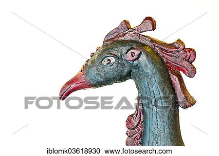 Stock Image - "Head of a peacock made of wood, Vembanad lake, Kerala, India, Asia". Fotosearch